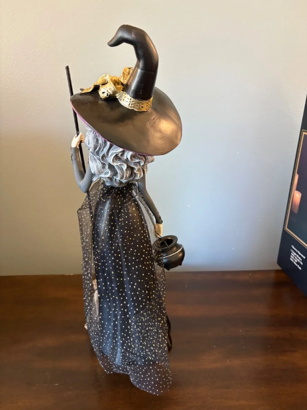Elegant Black Witch Figurine with Purple Hat - Home Accents
